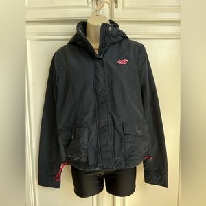 Hollister Dark Navy Blue Rain Jacket with 2 front pockets. Size Large